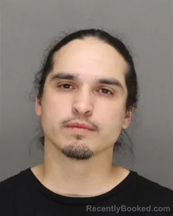 Mugshot of Aaron Luciano Tirado booked in Brown County, Wisconsin on October 8, 2026