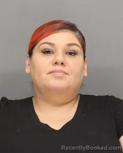 Mugshot of Amber Nicole Flores booked in Brown County, Wisconsin on October 9, 2026