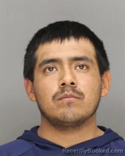 Mugshot of Julio Cesar Flores-Luis booked in Brown County, Wisconsin on October 18, 2026