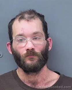 Mugshot of MICHAEL CLINTON EDWARD BUTTKE