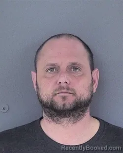 Mugshot of MICHAEL JOHN COHOON