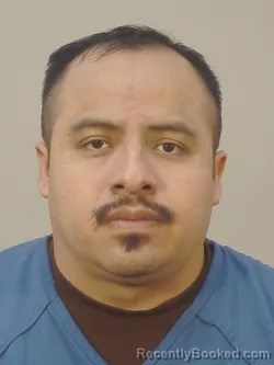 Mugshot of TIBURCIO CESAR JIMENEZ MARTINEZ