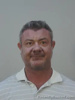 Mugshot of JUSTIN MICHAEL FAUST