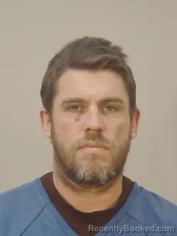 Mugshot of TRAVIS TYLER WALSH