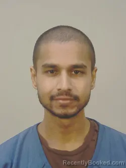 Mugshot of ADITYA VEERAN ASWANI booked in Dane County, Wisconsin on March 15, 2026