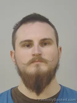 Mugshot of DANIEL SHINE ISZCZYSZYN booked in Dane County, Wisconsin on March 16, 2026