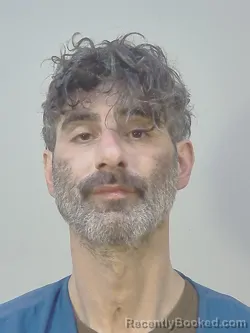 Mugshot of ANDREAS JAMES VERRIOS booked in Dane County, Wisconsin on March 21, 2026