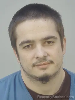 Mugshot of BRANDON THOMAS BACH booked in Dane County, Wisconsin on March 23, 2026