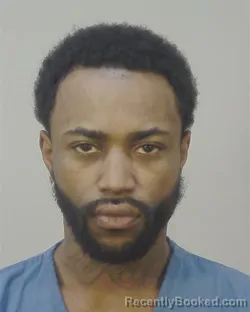 Mugshot of OMAR SHAREFFE REED booked in Dane County, Wisconsin on March 29, 2026