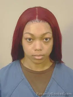 Mugshot of CINIYAH CORIANI JOHNSON booked in Dane County, Wisconsin on May 7, 2026