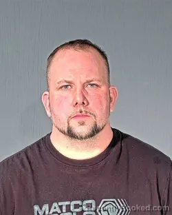 Mugshot of JASON DANIEL MICKOW