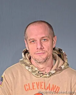 Mugshot of MATTHEW A MENZER