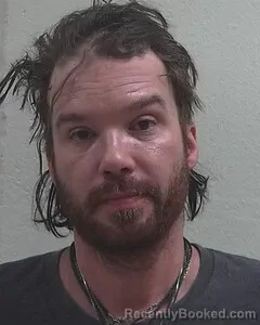 Mugshot of TREVOR B SNYDER