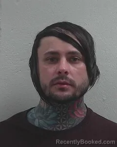 Mugshot of NICHOLAS W QUINONES