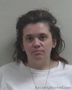 Mugshot of COURTNEY L DEFOE