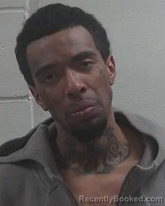 Mugshot of TQUAN C MOORE booked in Douglas County, Wisconsin on April 28, 2026