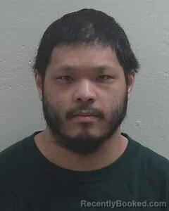 Mugshot of XENG N XIONG booked in Douglas County, Wisconsin on June 14, 2026