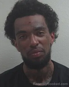 Mugshot of TQUAN C MOORE booked in Douglas County, Wisconsin on July 1, 2026