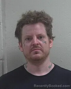 Mugshot of JORDAN L COOPER booked in Douglas County, Wisconsin on July 8, 2026