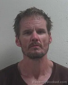 Mugshot of Neil M Hoppenen booked in Douglas County, Wisconsin on August 6, 2026