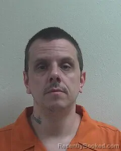 Mugshot of Russell L Deveau booked in Douglas County, Wisconsin on October 13, 2026