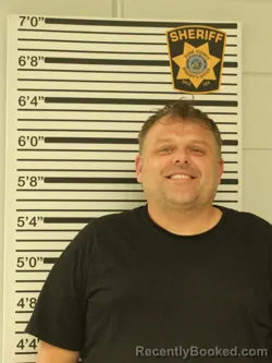 Mugshot of TRAVIS GRUHLKE booked in Dunn County, Wisconsin on May 31, 2026