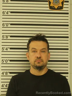 Mugshot of MARIGLEN JONUZAJ booked in Dunn County, Wisconsin on June 18, 2026