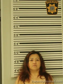 Mugshot of Pafoua Lor booked in Dunn County, Wisconsin on August 20, 2026