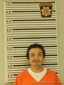 Mugshot of Peter X Her booked in Dunn County, Wisconsin on September 25, 2026