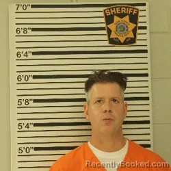 Mugshot of Nicolas Joseph Madland booked in Dunn County, Wisconsin on October 13, 2026