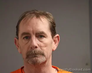 Mugshot of ERICK L LOMKER