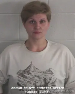 Mugshot of DIXIE MARIE OLSON booked in Juneau County, Wisconsin on March 29, 2026