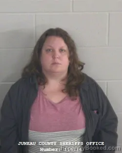 Mugshot of AMBER D WHITE booked in Juneau County, Wisconsin on April 22, 2026