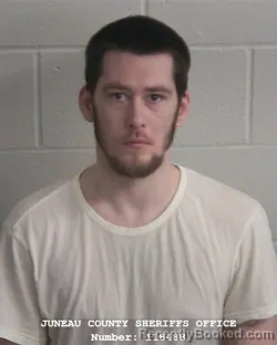 Mugshot of AARON JAMES ADKINS booked in Juneau County, Wisconsin on May 12, 2026