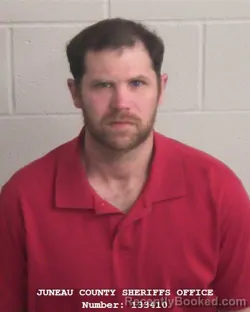 Mugshot of DALLAS WADE ARNESON booked in Juneau County, Wisconsin on March 24, 2026