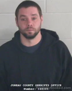 Mugshot of CLINTON J JOHNSON booked in Juneau County, Wisconsin on March 28, 2026