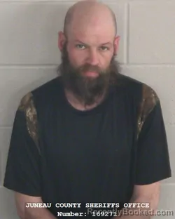 Mugshot of MATTHEW J MILLER booked in Juneau County, Wisconsin on April 22, 2026