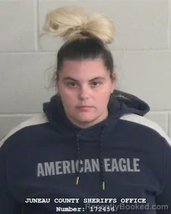 Mugshot of AMANDA LYNN DELLIOS booked in Juneau County, Wisconsin on May 6, 2026