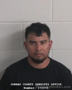 Mugshot of Jorge L Arias Torres booked in Juneau County, Wisconsin on August 27, 2026