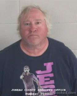 Mugshot of JEFFREY MICHAEL OLM booked in Juneau County, Wisconsin on May 24, 2026