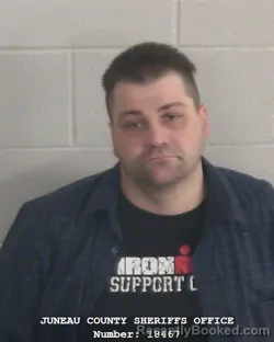 Mugshot of BLAKE A OLSON booked in Juneau County, Wisconsin on March 30, 2026