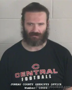 Mugshot of SHANE PLUMLEY booked in Juneau County, Wisconsin on April 24, 2026