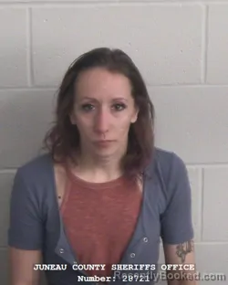 Mugshot of MEGAN RENAE PETERS booked in Juneau County, Wisconsin on May 14, 2026