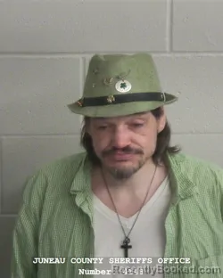 Mugshot of MATTHEW THOMAS VIRNIG booked in Juneau County, Wisconsin on March 17, 2026