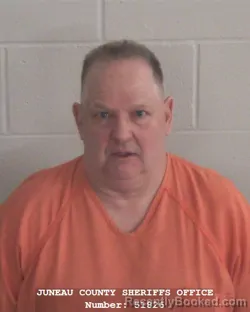 Mugshot of JAMES MICHAEL MIGACH booked in Juneau County, Wisconsin on March 20, 2026