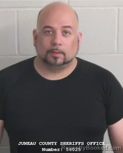 Mugshot of JESUS ARELLANO booked in Juneau County, Wisconsin on July 9, 2026