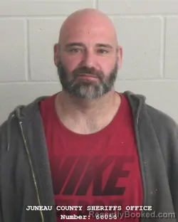 Mugshot of JEREMY WILLIAM DEVINE booked in Juneau County, Wisconsin on March 23, 2026