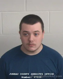 Mugshot of BRAIDEN MICHAEL RABINE booked in Juneau County, Wisconsin on April 1, 2026