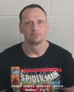 Mugshot of JEREMY DAVID DEZOTELL booked in Juneau County, Wisconsin on July 10, 2026