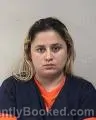 Mugshot of MILCA NALLIBI PLATA-DOMINGUEZ booked in Kenosha County, Wisconsin on April 29, 2026